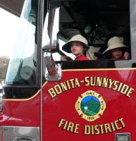 fire-truck-driving-boys.jpg